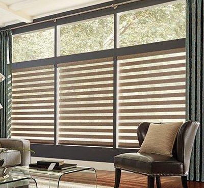 Natural colour tone window coverings in bright modern living room