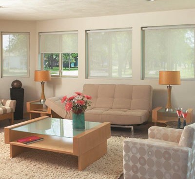 bright modern living room with light orange furniture and shades