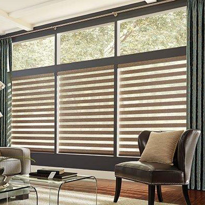 Natural colour tone window coverings in bright modern living room